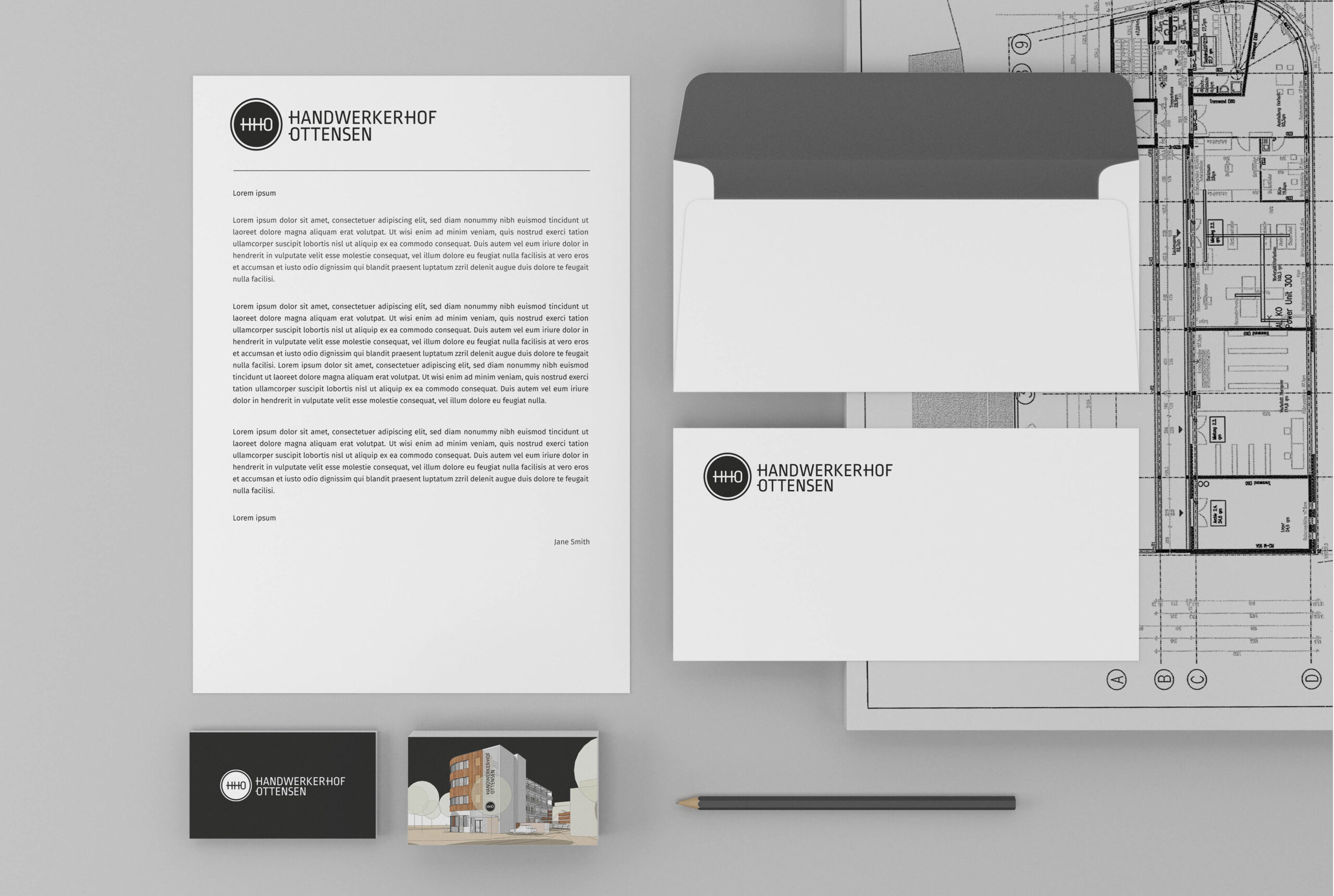 Geschäftsausstattung des Handwerkerhof Ottensen mit Briefpapier, Umschlägen und Visitenkarten im klaren Schwarz-Weiß-Design.